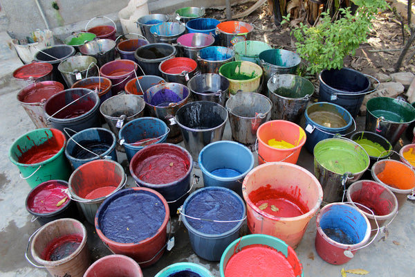 Buckets of ink at the block printing workshop, Ahmedabad.