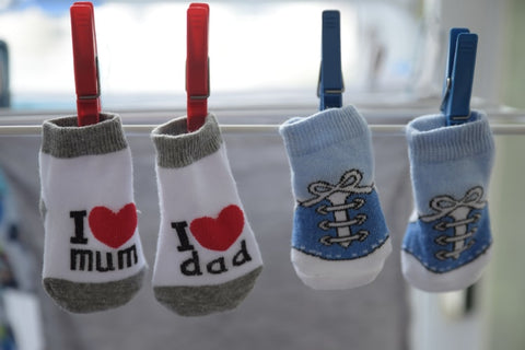 baby socks hung and drying.