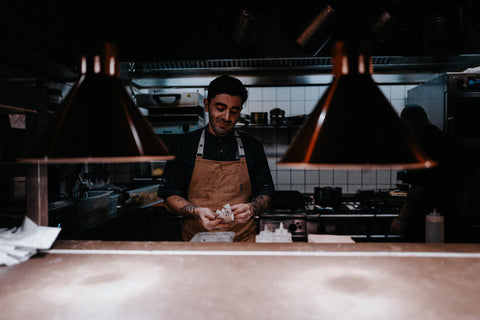 chef in the kitchen after the chaos of service