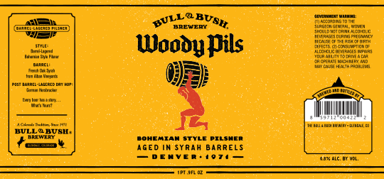 Image of the beer label for Woody Pils Barrel-Aged Pilsner, by Bull & Bush Brewery of Glendale, CO
