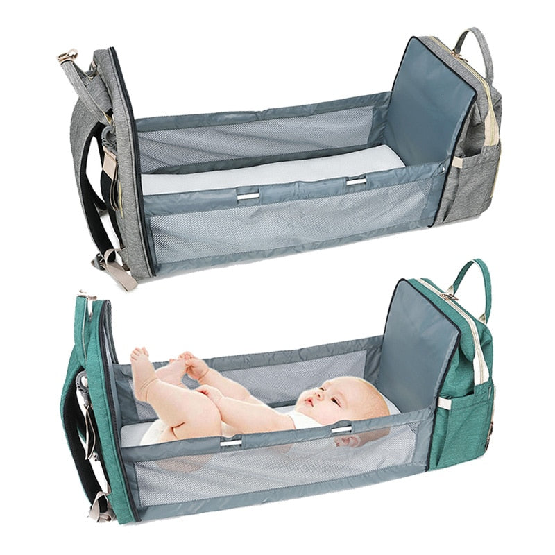 diaper bag that turns into a bed