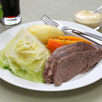 slow cooked beef with cabbage carrots and potatoes