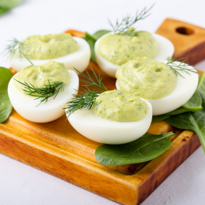 green deviled eggs made with avocado