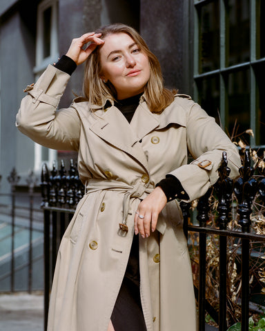 Petite Ellie in a trench coat