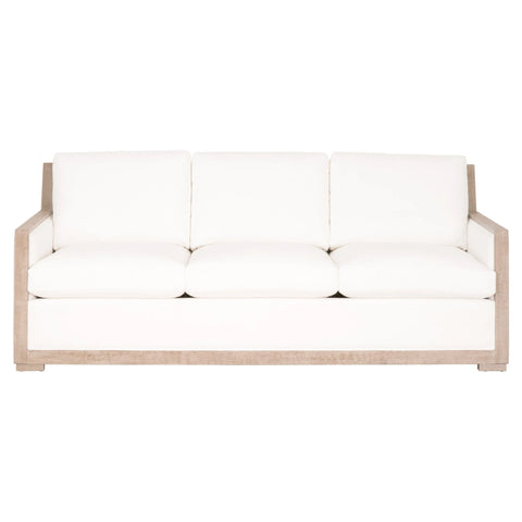 white upholstered sofa with wood trim, coastal style