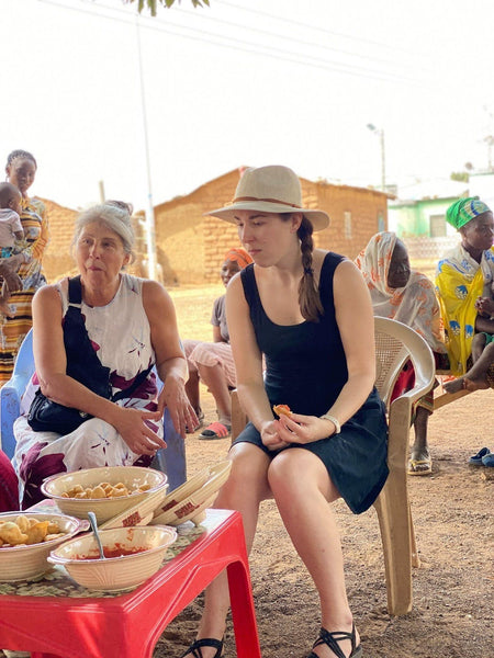 Watching traditional lunch be prepared with shea butter