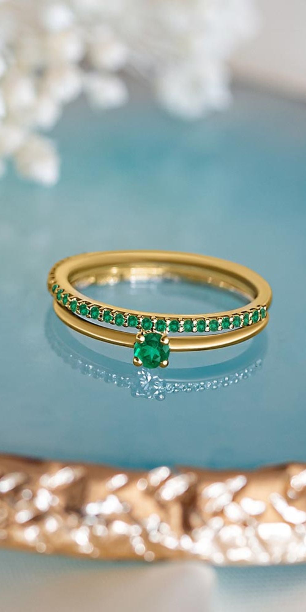 Solitaire emerald ring and emerald wedding band