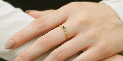 Baguette emerald engagement ring