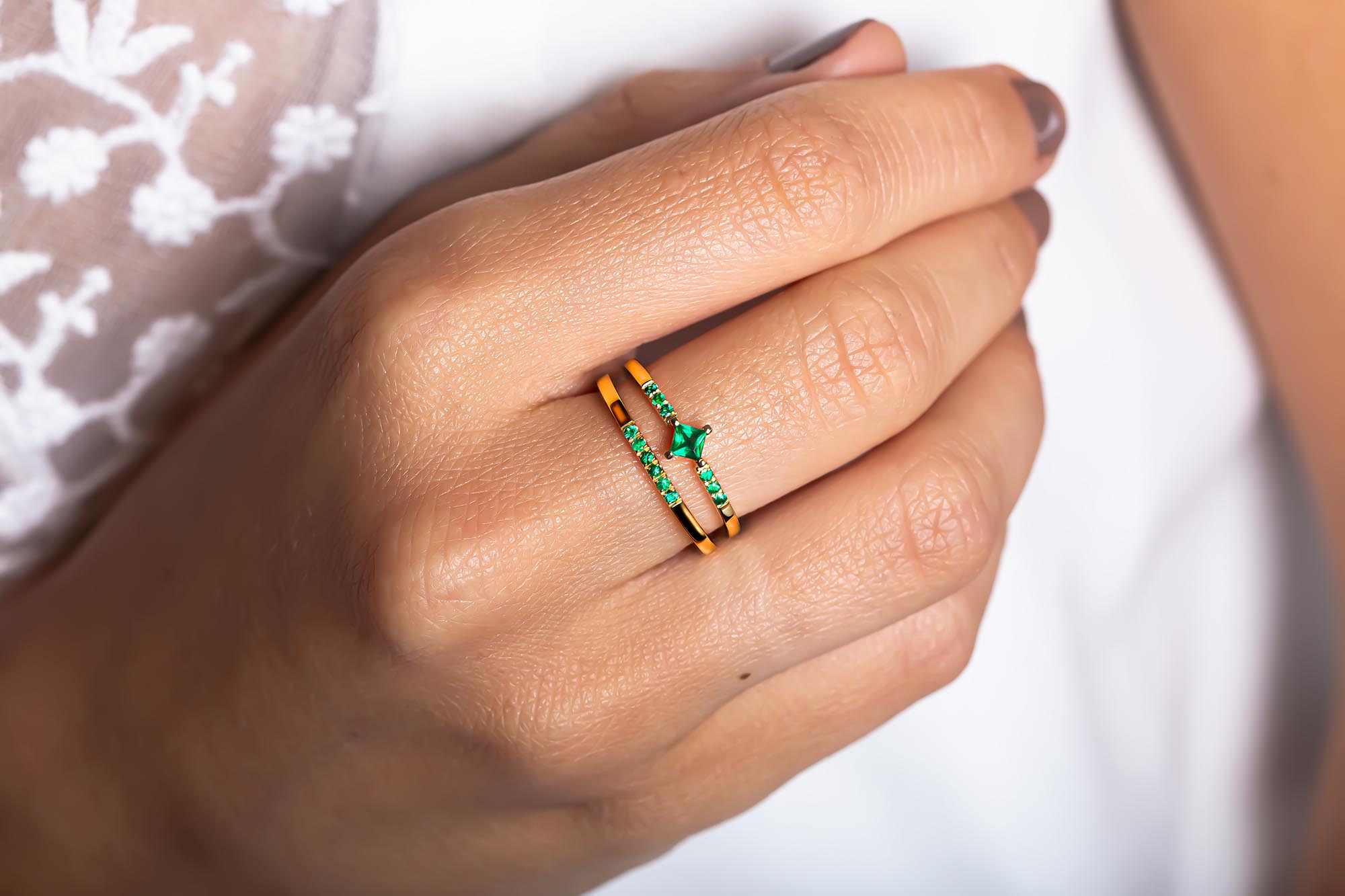 Fine emerald wedding band with emerald engagement ring