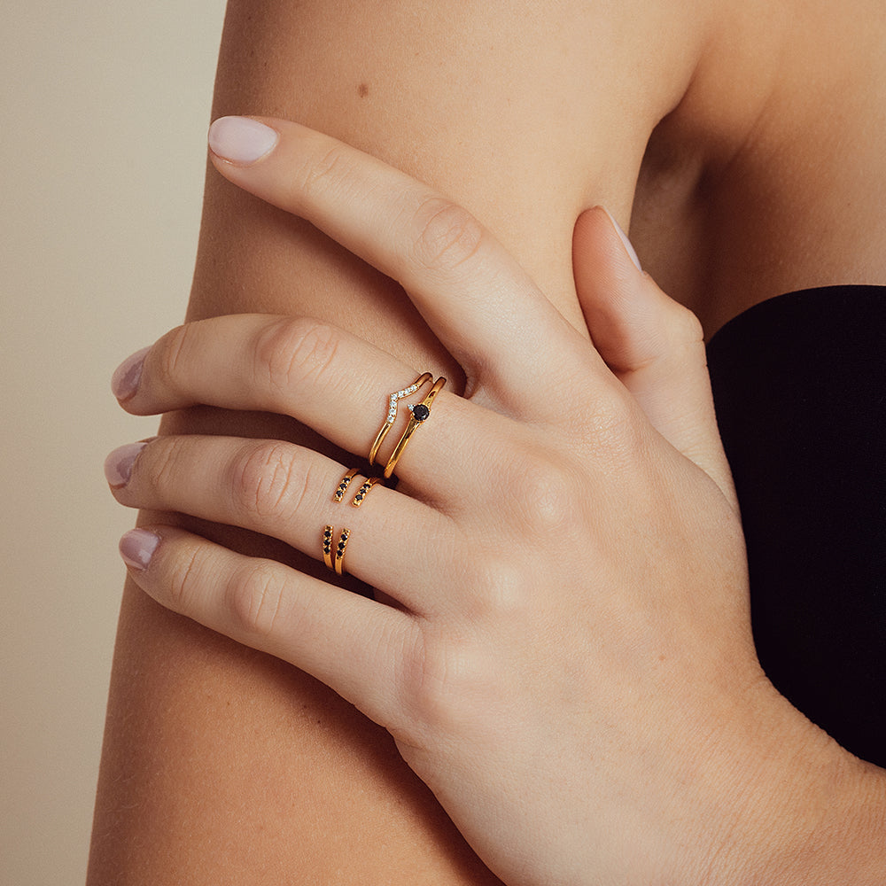 veda, devi and nisha rings in yellow gold and white/black diamonds