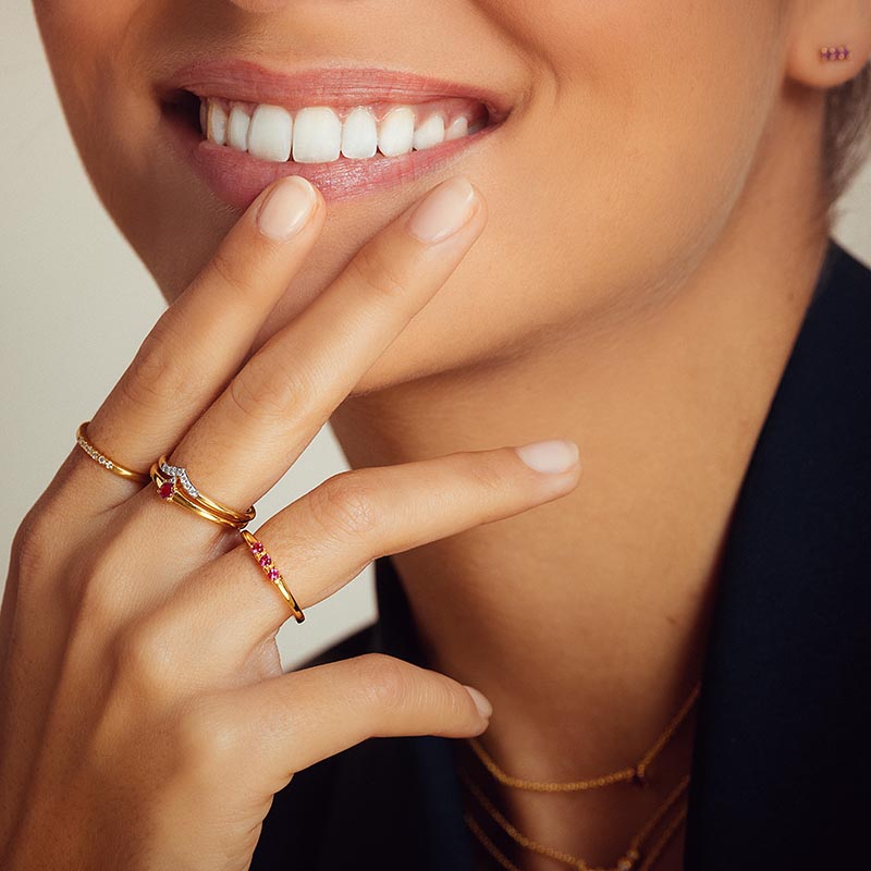 accumulated rings in gold vermeil set with rubies 