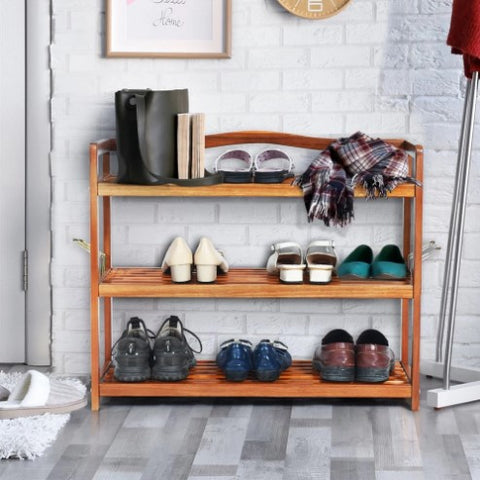 A wooden shoe rack with three tiers designed to store and organize shoes. The rack is made of natural wood and features a slatted design that allows air to circulate and prevent odors. The organizer can hold several pairs of shoes, and its compact size makes it suitable for small spaces. The shoe rack is sturdy and easy to assemble, providing a practical and stylish storage solution for your footwear collection.