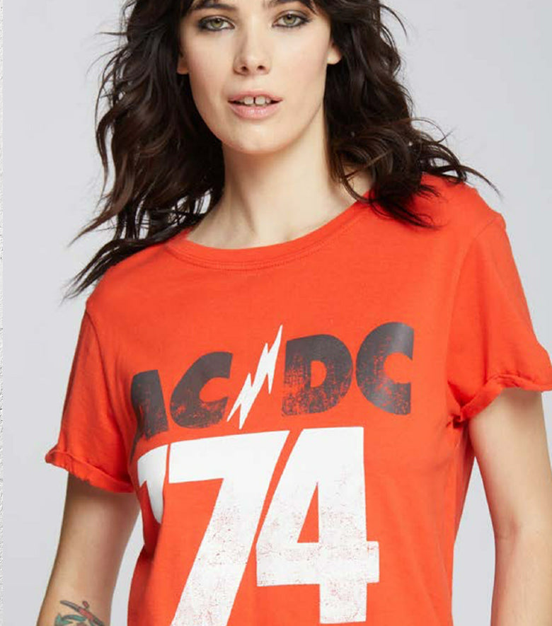 woman in red tee with acdc print