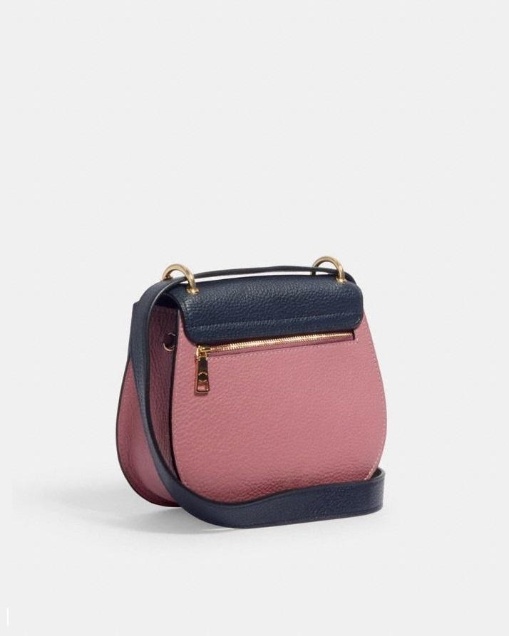 remi saddle bag in colorblock signature canvas