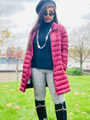 Outfit shot of person wearing red jacket facing the camera