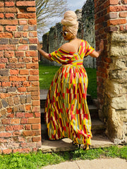 Portrait photograph of Pride of Africa Gown | One Wear Freedom Clothing Rental