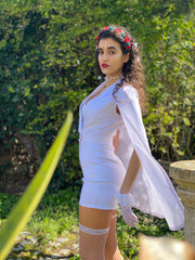 Portrait photo of woman wearing rented white playsuit | One Wear Freedom