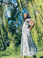 Portrait photo of woman wearing rented wrap dress | One Wear Freedom