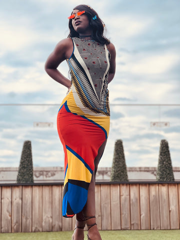 Portrait photo of rented Bold + Beautiful Multi Print Dress | One Wear Freedom