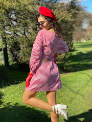 Outfit shot of person wearing checkered matching wrap co-ord facing away from camera