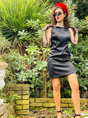 Outfit shot of person wearing black mini dress