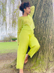 Portrait photo of woman wearing rented lime co-ord | One Wear Freedom
