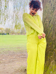 Portrait photo of woman wearing rented lime co-ord | One Wear Freedom