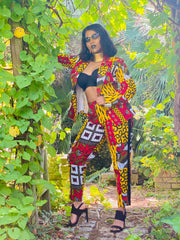 Portrait photograph of Fire + Gold Ankara Blazer + Trouser Suit | One Wear Freedom Clothing Rental