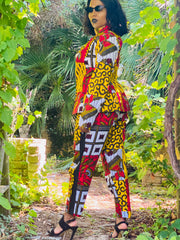 Portrait photograph of Fire + Gold Ankara Blazer + Trouser Suit | One Wear Freedom Clothing Rental