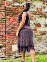 Outfit shot of person wearing rented brown skirt and lace up top