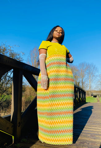 Portrait photograph of woman wearing rented Evergreen Maxi Crochet Dress | One Wear Freedom