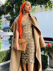 Outfit shot of person wearing gold dress facing forward