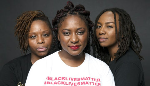 Lanscape photograph of Opal Tometi, Patrisse Cullors and Alicia Garza | One Wear Freedom