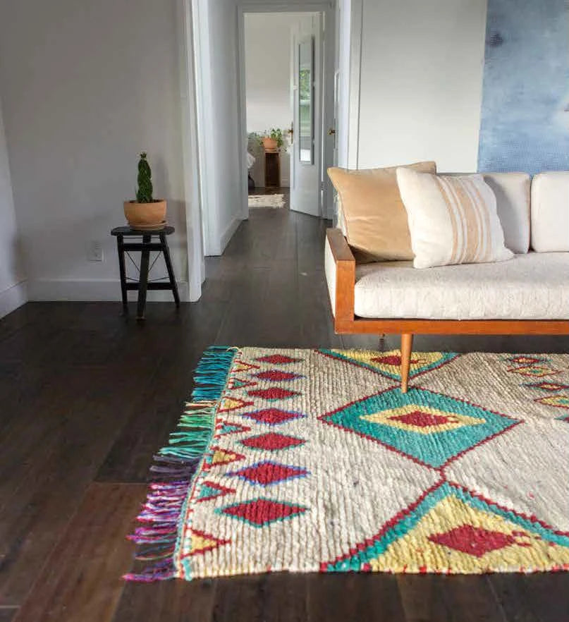 Bohemian living room featuring colorful Moroccan rug