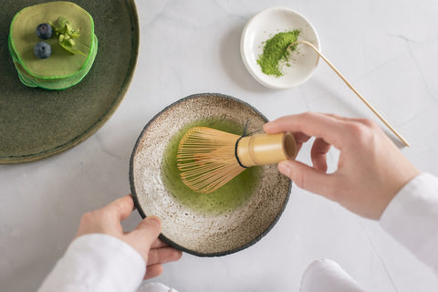 mixing matcha powder