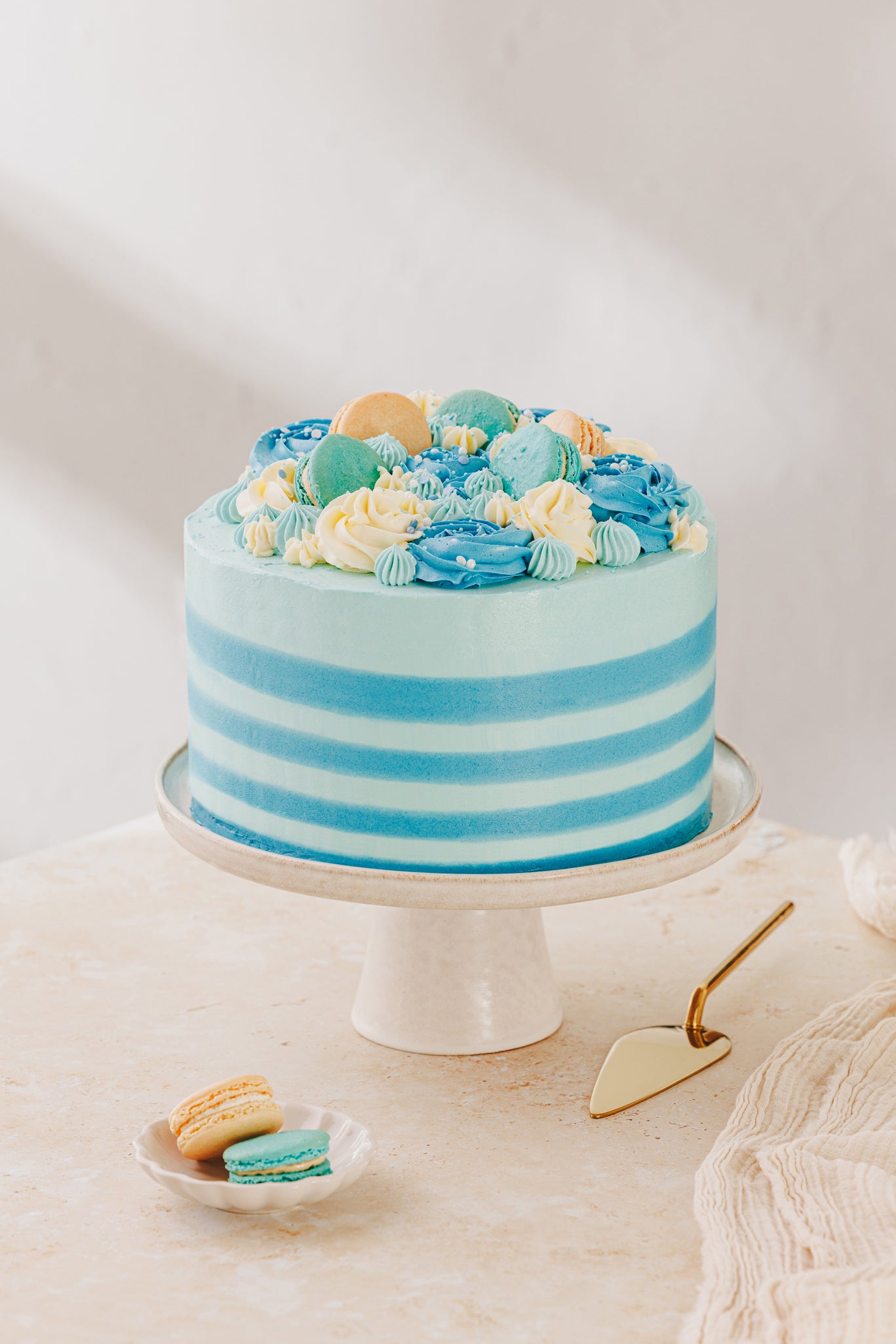 Blue candy-striped Patisserie Valerie cake