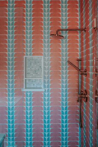 Marigold tile in arches style in creamsicle in shower backsplash wall