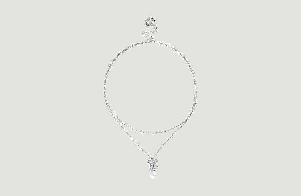 Crystal Bow with Pearl Double Chain Pendant