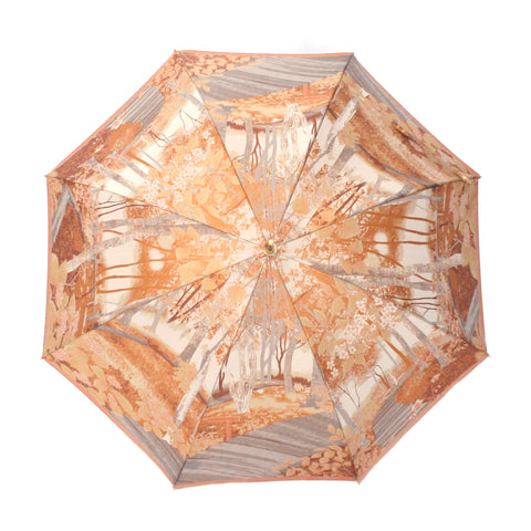 オレンジ色の晴雨兼用婦人傘