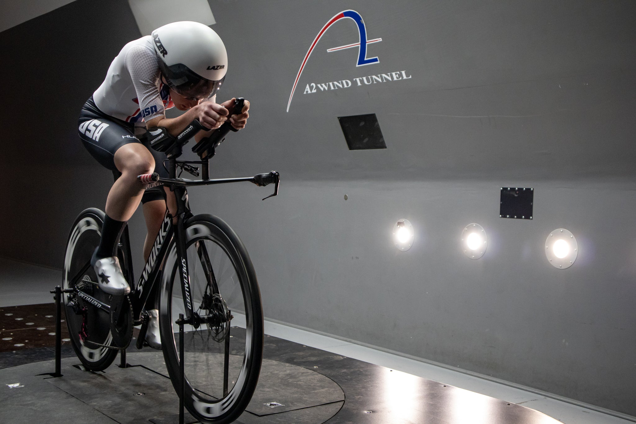 Clara Brown in a wind tunnel wearing a Lazer Aero helmet 