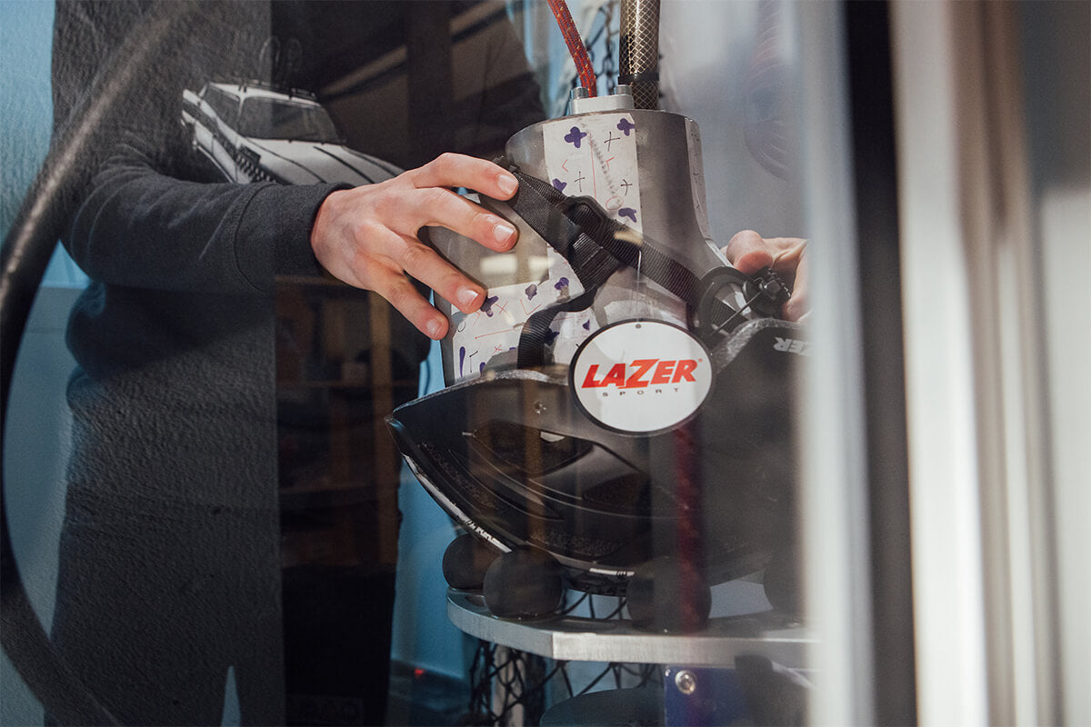 Lazer helmet being tested at Lazer HQ. Learn how MIPS improves the helmets protection rating