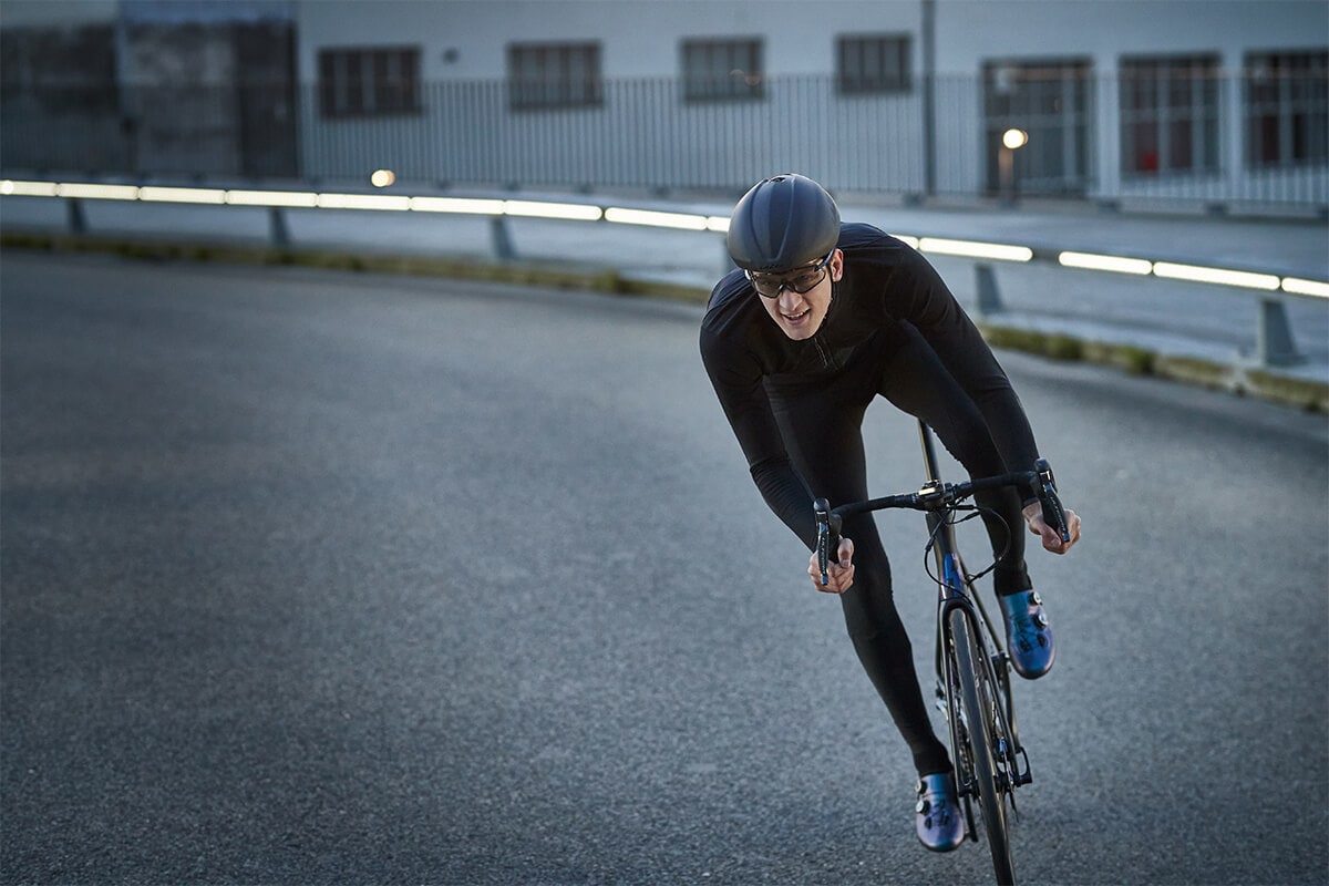 Man riding a road bike wearing a Lazer G1 MIPS Road bike Helmet 