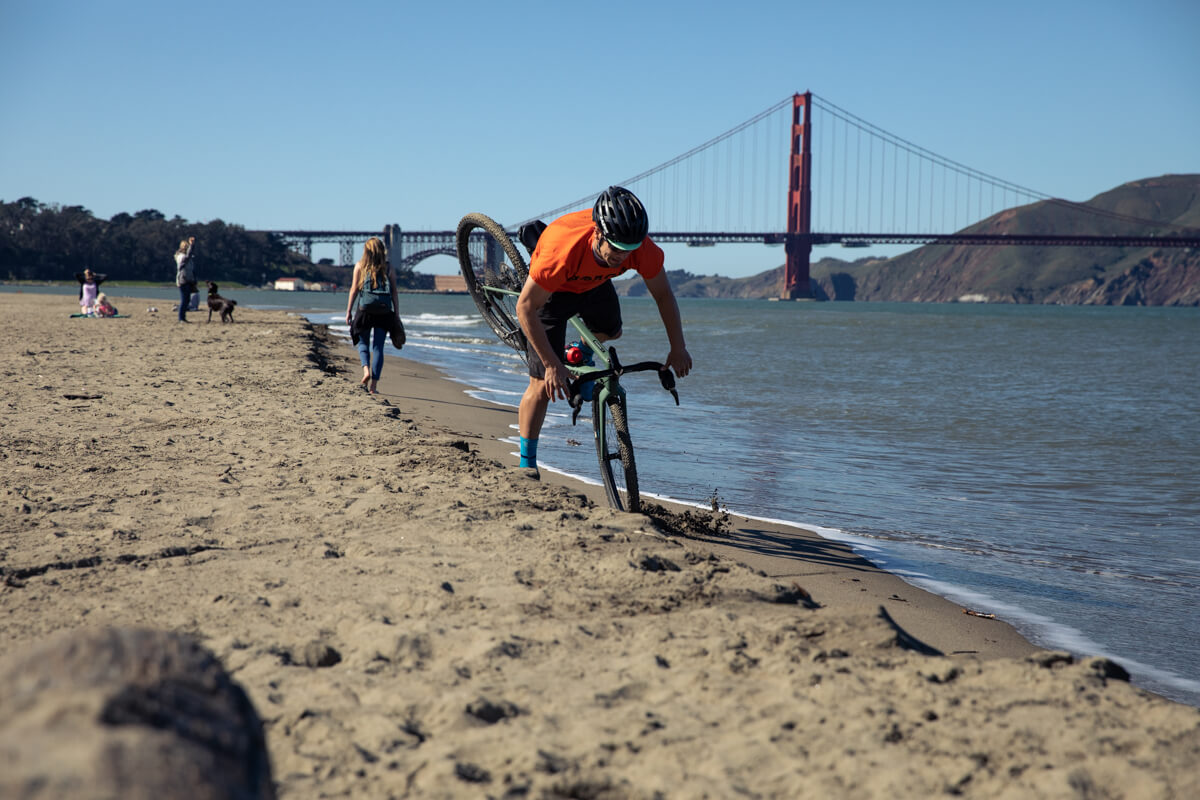 Over the bars Drew goes riding at the beach in SF wearing his Lazer Z1 MIPS road cycling helmet