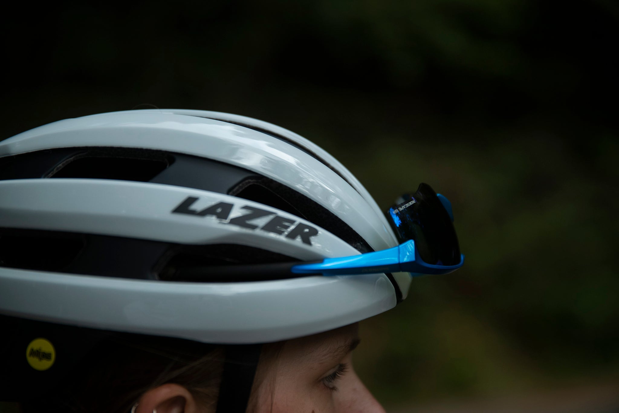 Women wear a Lazer Sphere MIPS Road Bike Helmet as she rides her bike