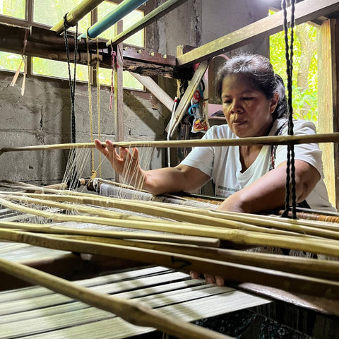 Amalia Toledo is the first among SLMPC members to master pick-up weaving which allows her to create a wide variety of textile designs with the handloom. This weaving technique involves selecting specific warp yarn and picking them up individually or in groups using sticks or a similar tool.