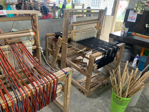 Wooden handlooms at Indigenous Enabel Craft. Jocelyn can weave 8-10 yards of fabric per day depending on the harness type and designs.