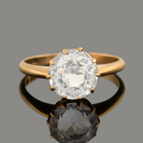 white sapphire solitaire ring