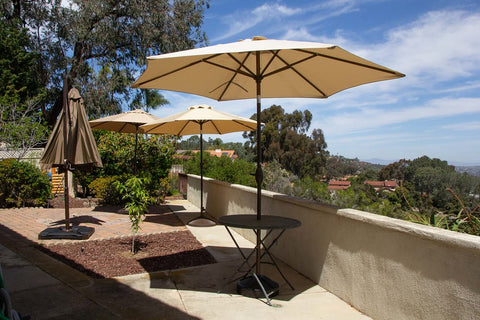 Clean patio umbrellas providing shade outside.