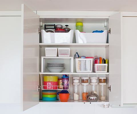 Kitchen cabinet filled with organizers