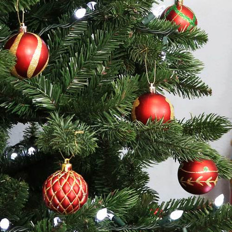 Make sure to decorate your Christmas tree with plenty of gorgeous hanging Christmas ornaments.